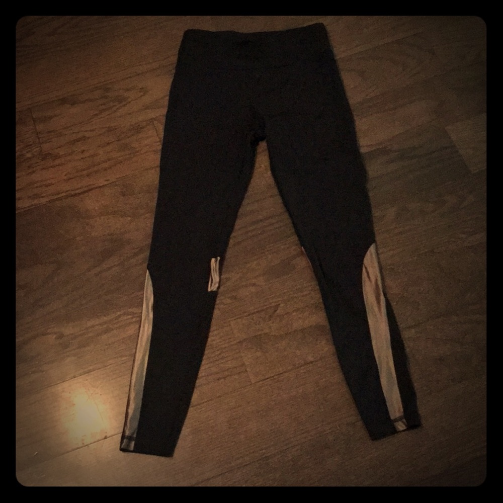 Black Alala with metallic and perforated details